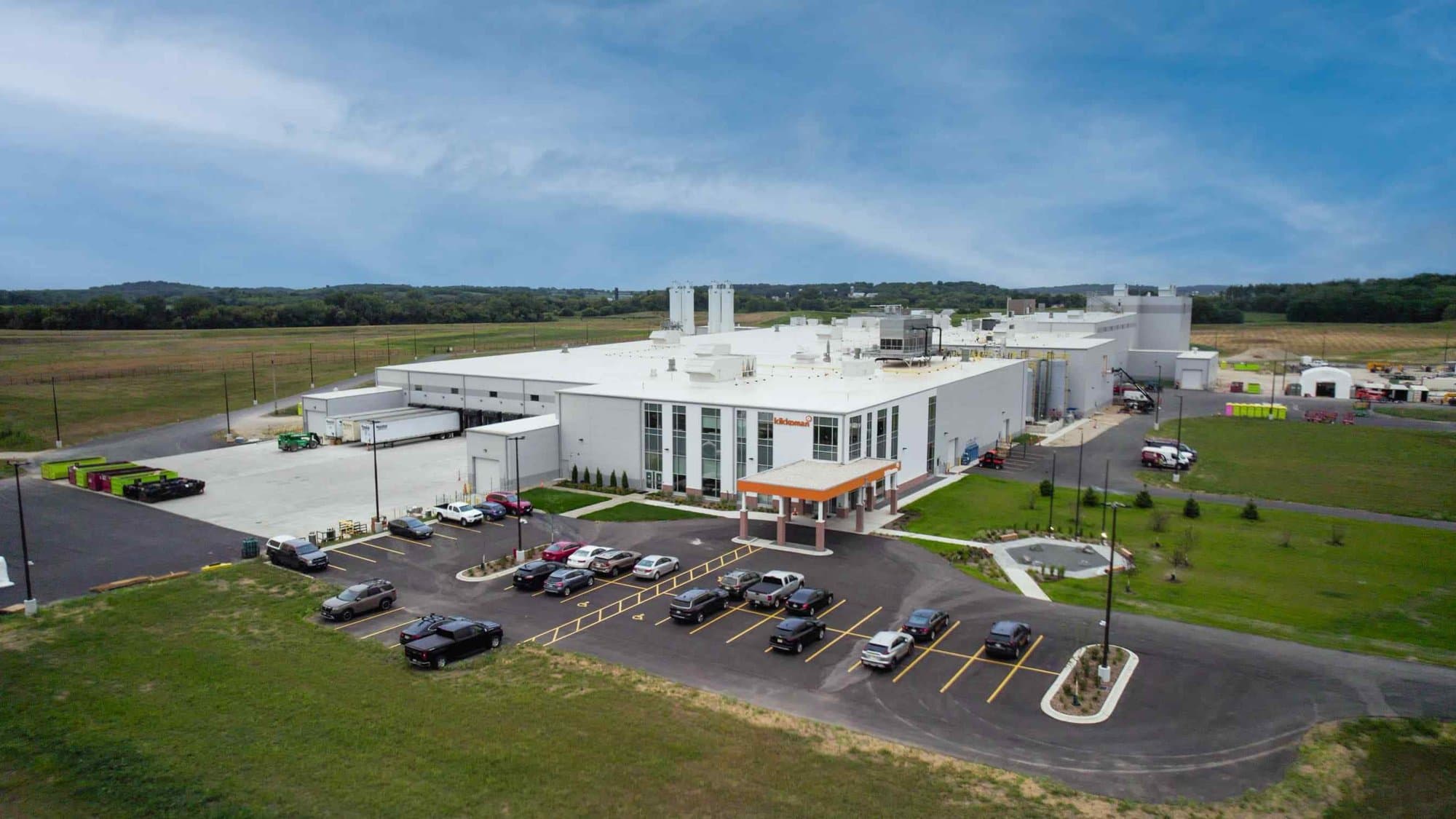 Aerial view of Kikkoman’s white Jefferson, Wisconsin production plant and parking lot